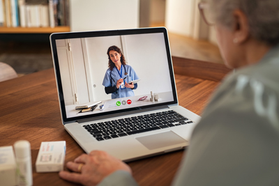 Senior woman on a telehealth session.